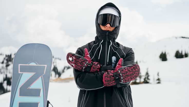 Snowboarder with Burton mittens