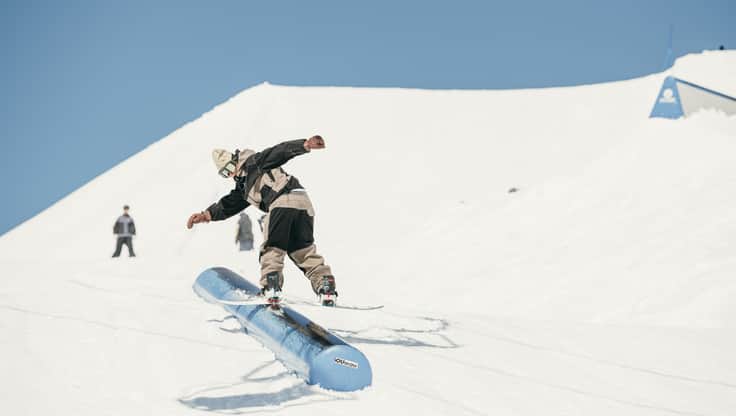 Blue Tomato Team Rider Felix Widnig going off a kicker with medium bindings